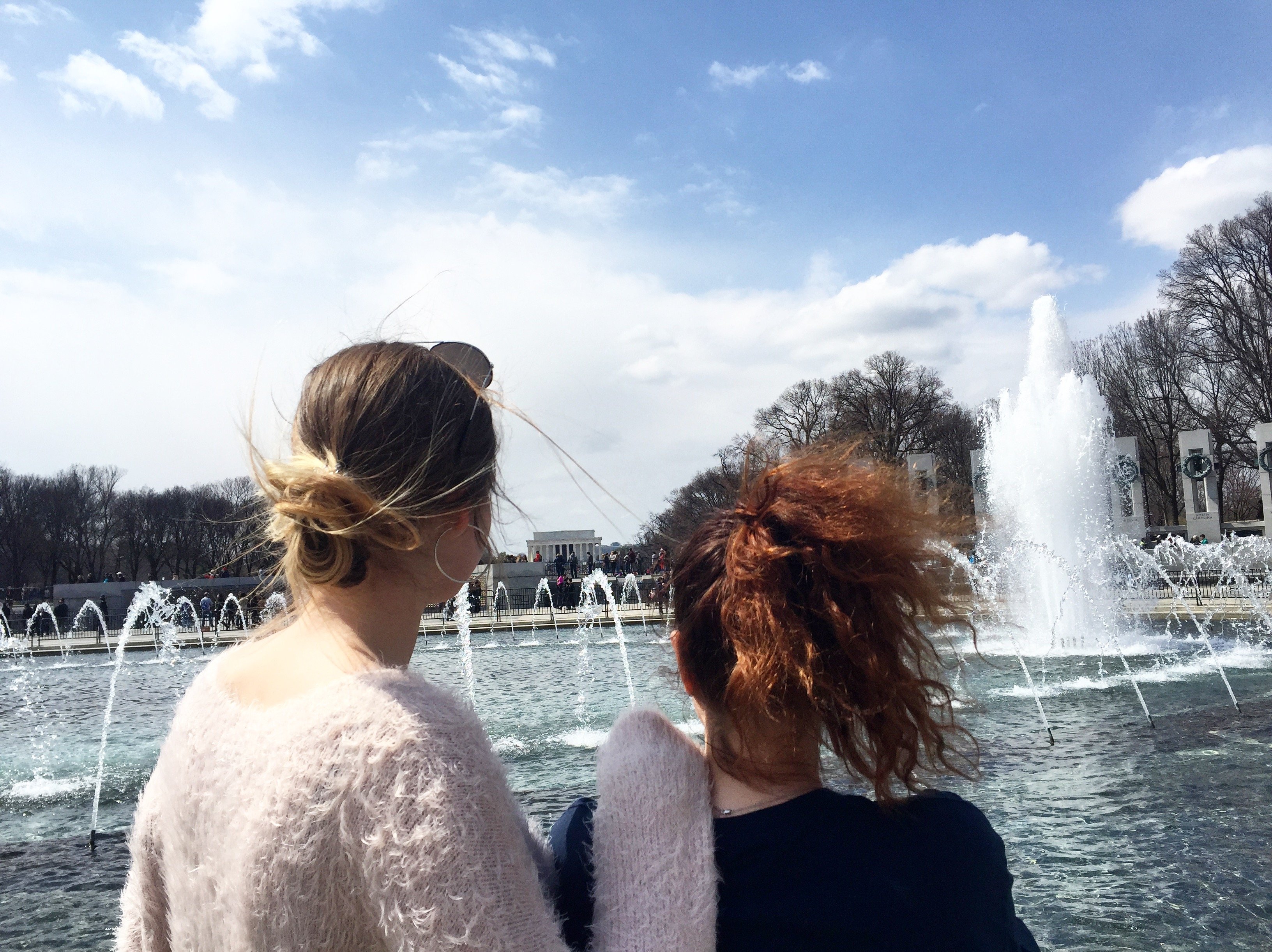 Vanessa and her sister in Washigton, D.C. by the water.